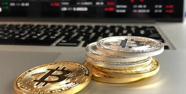 eToro Cuts Crypto Costs