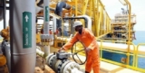 Oil Gains, Crude Inventories Fall